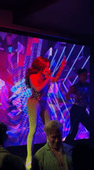 Drag performer entertains nightclub audience in Kuta, Indonesia