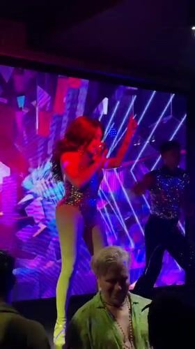 Drag performer entertains nightclub audience in Kuta, Indonesia