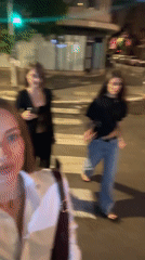 Evening street scenes featuring young women documented in Tel Aviv