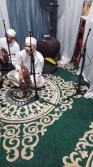 Islamic gathering in East Jakarta with recitation and formal seating