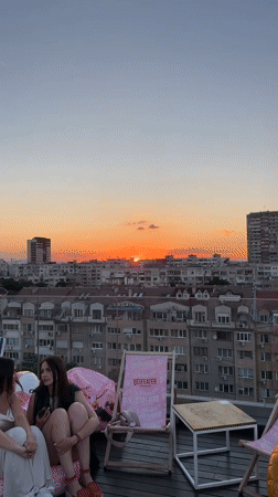 Rooftop evening hang in Sofia at golden hour