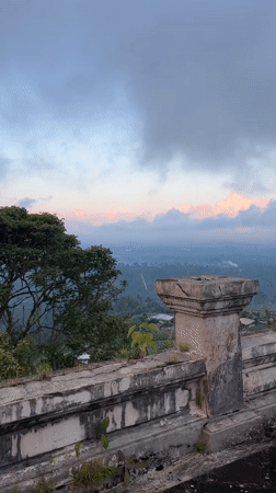 Overcast morning view from concrete balcony in Mekarsari