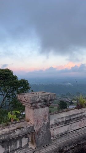 Overcast morning view from concrete balcony in Mekarsari