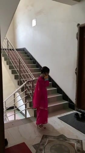 Playful moments in a pink embroidered dress, Dhaka interior