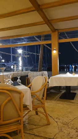 Outdoor restaurant dining captured in nighttime Hurghada scene