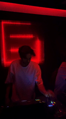 DJ performs at red-lit Tel Aviv club
