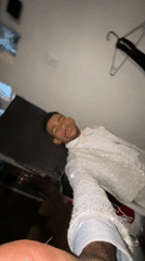 Coordinated performers in sequined white outfits documented in Porlamar venue