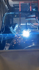 Welder conducts operations on cylindrical object in Montenegro facility