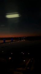 Nighttime waterfront scene captured in Perm, Russia