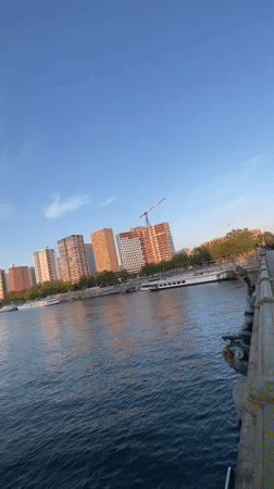 Calm evening on the Seine, fishing and bikes near the Eiffel Tower