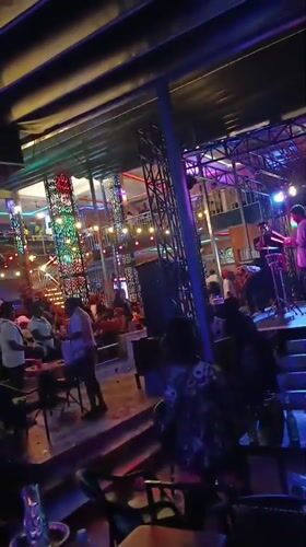 Live band performs at outdoor bar in Onitsha
