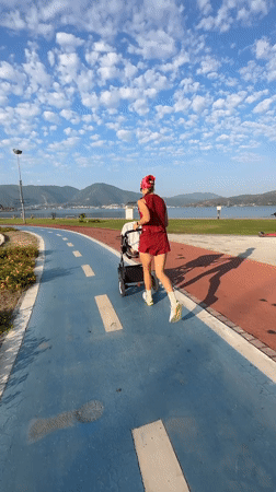 Jogging with a stroller along Fethiye's colorful park path