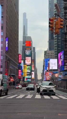 Times Square streets and billboards on a quiet June morning