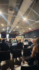 Audience gathers in large hall for event in Barcelona