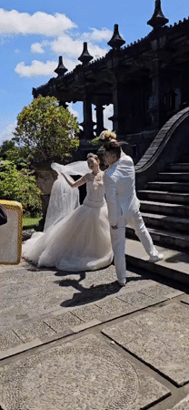 Wedding photoshoot captured at stone building in Denpasar