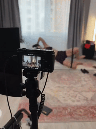 Home workout session with resistance bands and dumbbells, Tyumen