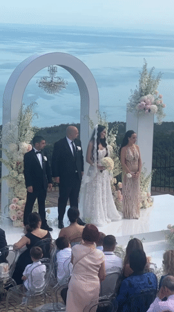 Wedding ceremony held on seaside platform in Balchik, Bulgaria