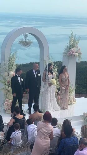 Wedding ceremony held on seaside platform in Balchik, Bulgaria