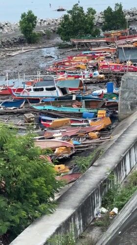 Evening coastal life documented around Davao City harbor area