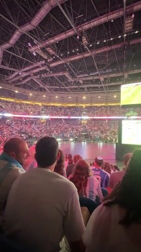 Packed Tel Aviv arena screens live soccer to a full crowd