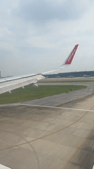 Vietjet Air plane taxis on runway at Hanoi airport