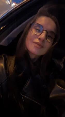 Woman in leather jacket spotted in moving vehicle, Yekaterinburg