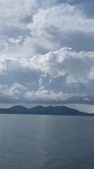 Person enjoys ocean view from boat near Ko Tao