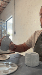 Artist works with ceramics and liquids in Mexico studio