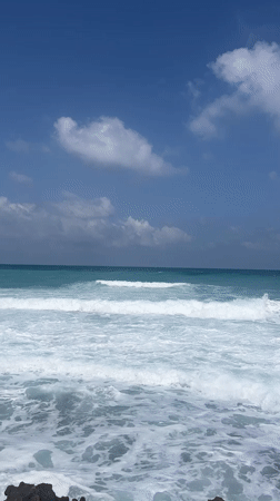 Summer morning at Palmachim's rocky turquoise shore