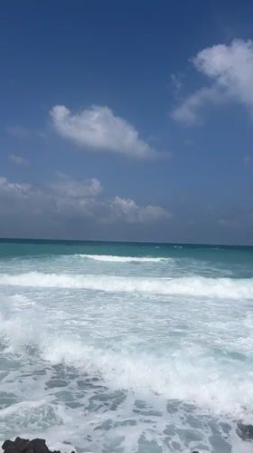 Summer morning at Palmachim's rocky turquoise shore