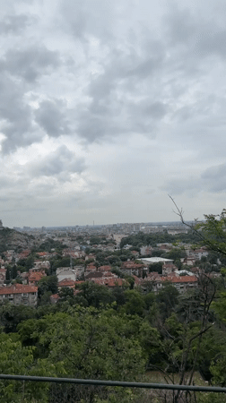Tourist captures Plovdiv's historic stone architecture and cityscape views