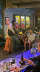 Musicians perform at tropical-themed venue in Pokhara, Nepal