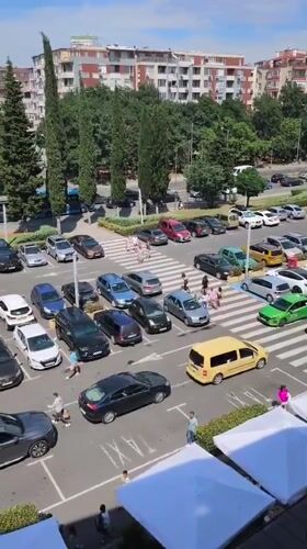 Busy sunny parking lot in Burgas, Bulgaria