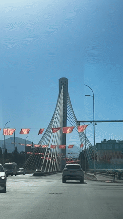 Morning routines documented across Podgorica bridge and coffee shop