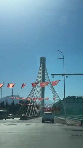 Morning routines documented across Podgorica bridge and coffee shop