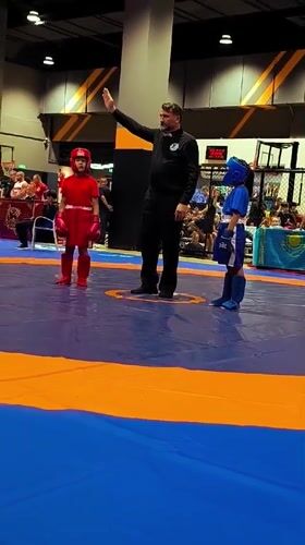 Martial arts tournament medals, mats, and a neon billiards hall