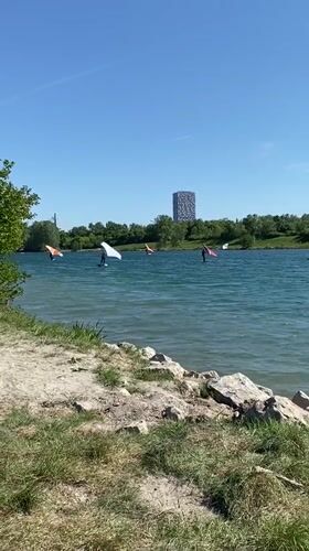 Water sports enthusiasts enjoy sunny afternoon at Vienna lake