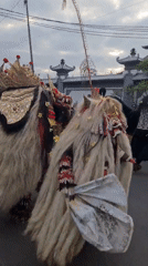 Traditional Balinese procession winds through Denpasar streets