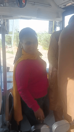 Bus passengers documented during morning commute in Jos, Nigeria