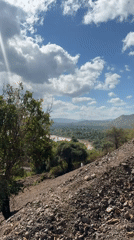 Rocky highlands meet a green river valley in Sumbawa