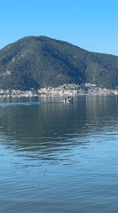 Motorboat crosses calm Fethiye bay waters Tuesday morning
