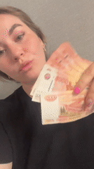 Currency display scenes documented in Chaikovsky, Russia