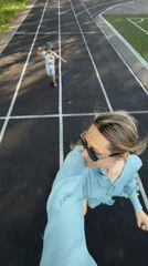 Mother and child spend afternoon at Chaikovsky running track
