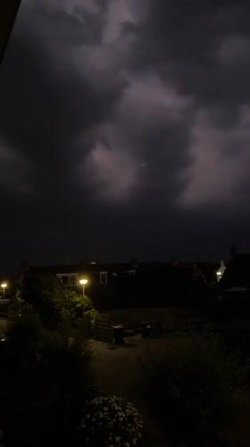 Stormy night settles over a quiet Petten neighborhood