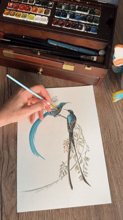 Inside a Khimki artist's studio, watercolors and finished works on display