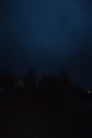 Storm moves over Kremenchuk neighborhoods after dark