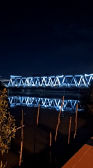 Night documentation of illuminated bridge and urban scenes in Lhokseumawe