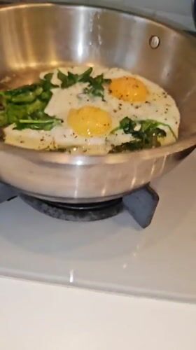 Eggs and spinach breakfast cooked and plated in Bataysk