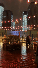 Moscow rooftop bar hosts evening gathering during rainfall