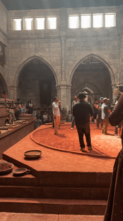 Man in medieval armor sleeps in chair, Mumbai